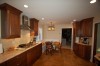 Kitchen Remodel - kitchen, cabinets, tile floor, eating area, cooktop, recessed lighting