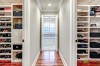 Westwind Renovation - view of his and her closets