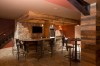 Completed Projects - reclaimed wood, basement bar, stacked stone, corrugated steel