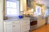 Expanded Luxury Kitchen - classic cabinetry with stainless, including stainless farmer sink