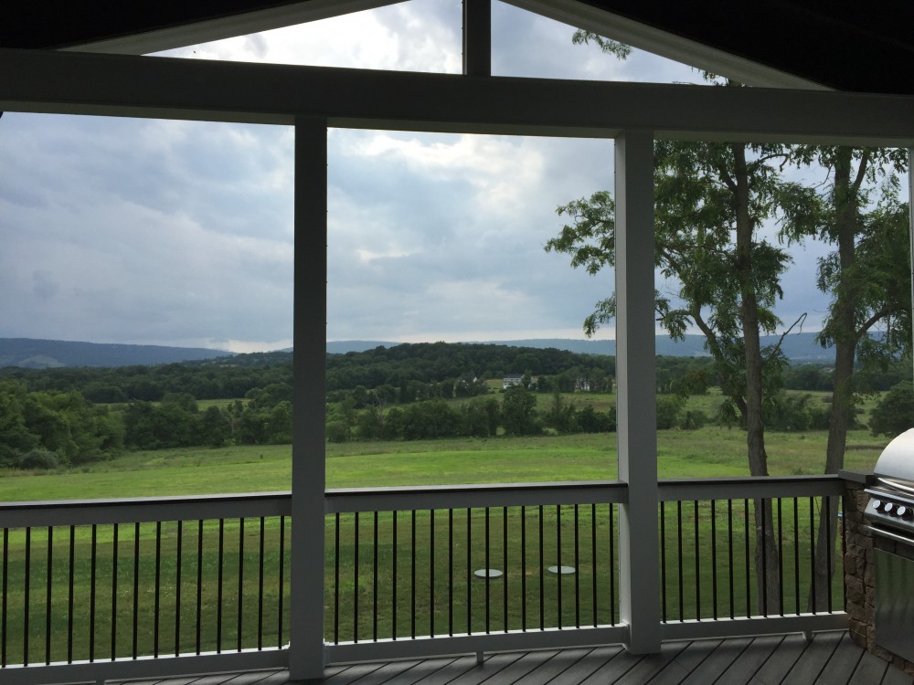 Photo By American Exteriors & Masonry. Screened Room In Purcellville, VA.