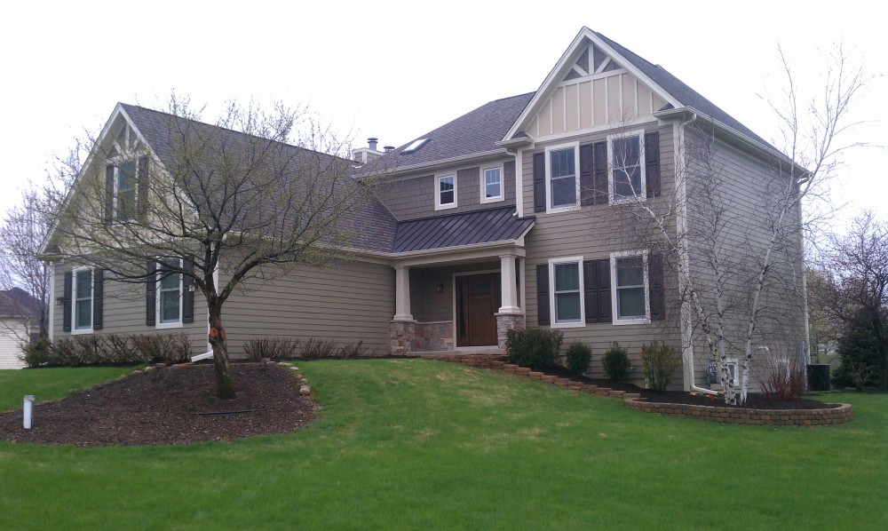 Photo By Erdmann Exterior Designs Ltd.. Complete Exterior Renovation: Elgin, IL