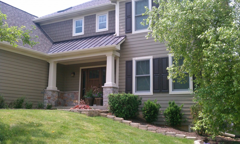 Photo By Erdmann Exterior Designs Ltd.. Complete Exterior Renovation: Elgin, IL