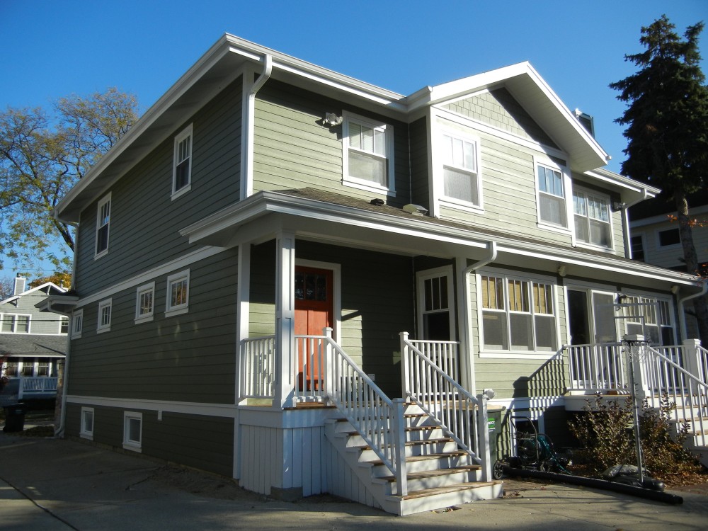 Photo By Erdmann Exterior Designs Ltd.. Custom Home Addition, James Hardie Siding: Arlington Heights, IL