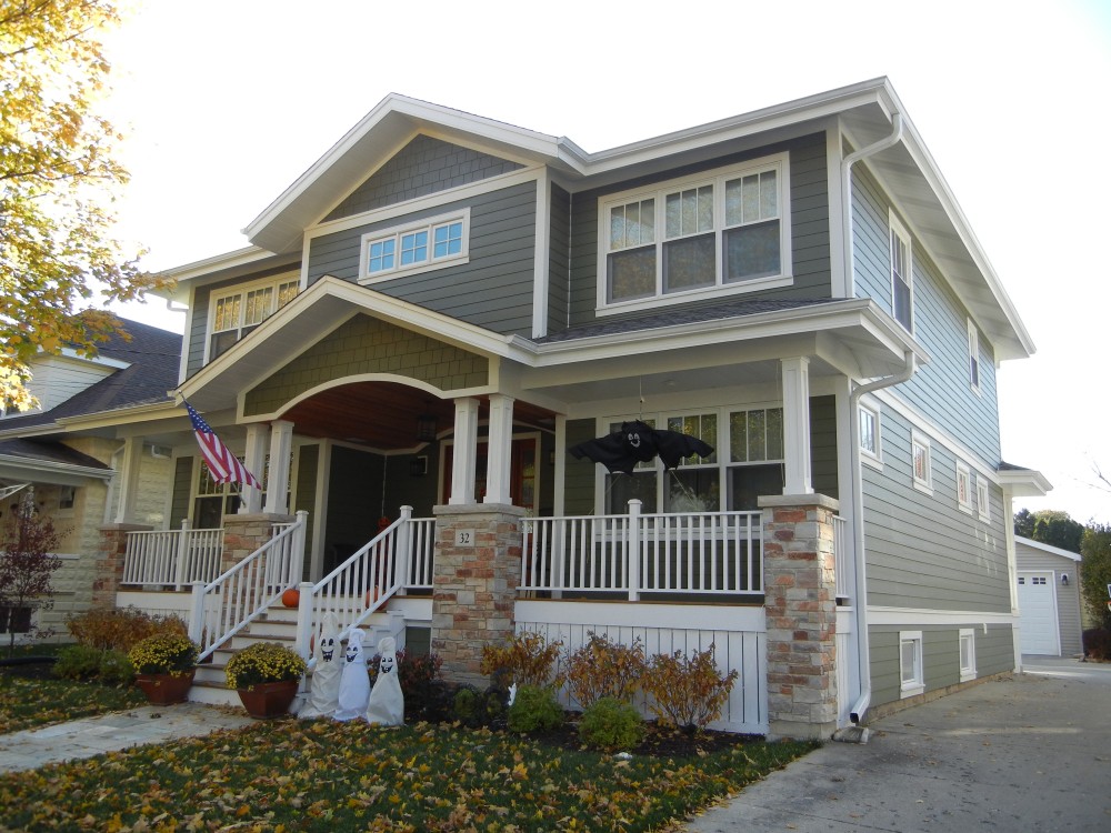 Photo By Erdmann Exterior Designs Ltd.. Custom Home Addition, James Hardie Siding: Arlington Heights, IL