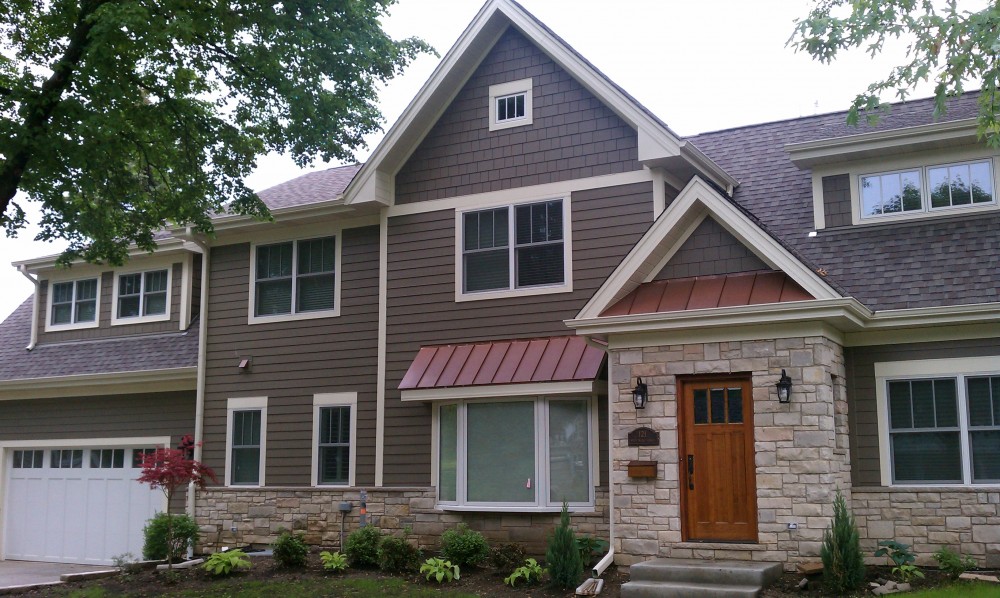 Photo By Erdmann Exterior Designs Ltd.. Custom Home Addition, James Hardie Siding: Arlington Heights, IL