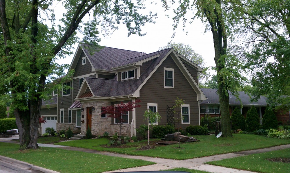 Photo By Erdmann Exterior Designs Ltd.. Custom Home Addition, James Hardie Siding: Arlington Heights, IL