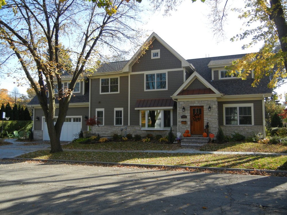 Photo By Erdmann Exterior Designs Ltd.. Custom Home Addition, James Hardie Siding: Arlington Heights, IL