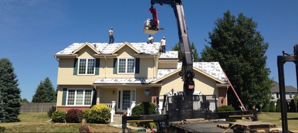 Photo By Excalibur Roofing. 