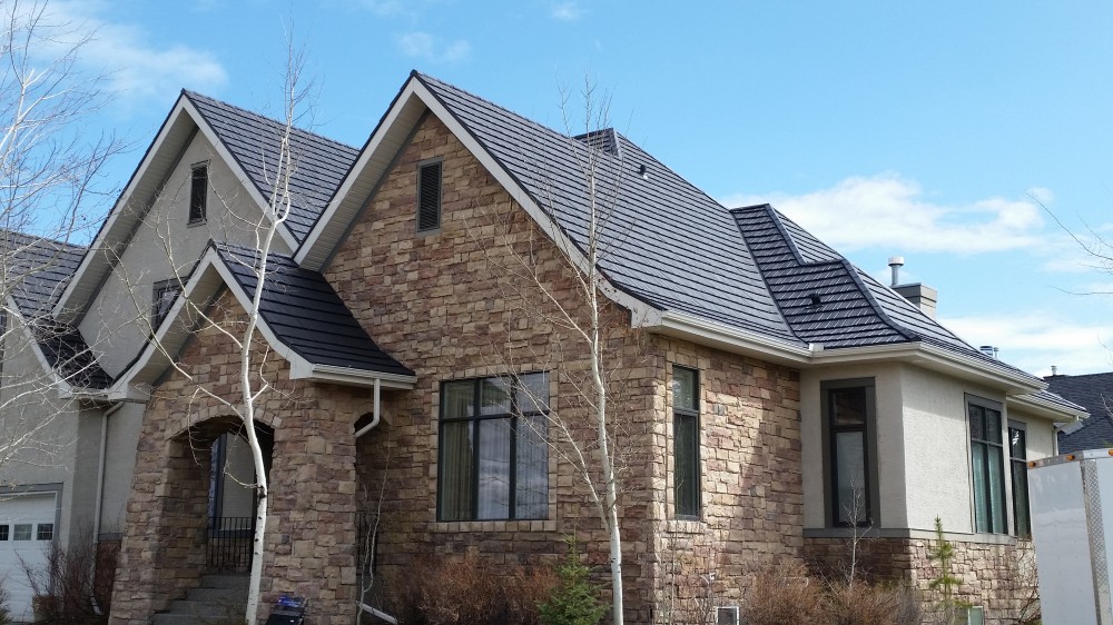 Photo By Renoteck Roofing. Iron Wood Shake