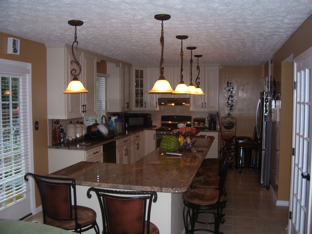 Photo By Starcom Design Build. Kitchens