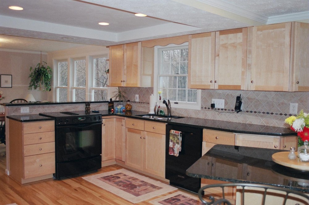 Photo By Starcom Design Build. Kitchens