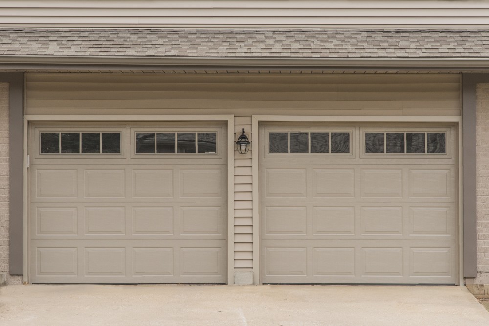 Photo By Johnson County Siding & Window Co.. Carriage Garage Doors