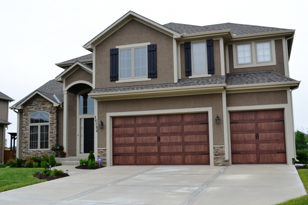 Photo By Johnson County Siding & Window Co.. Carriage Garage Doors