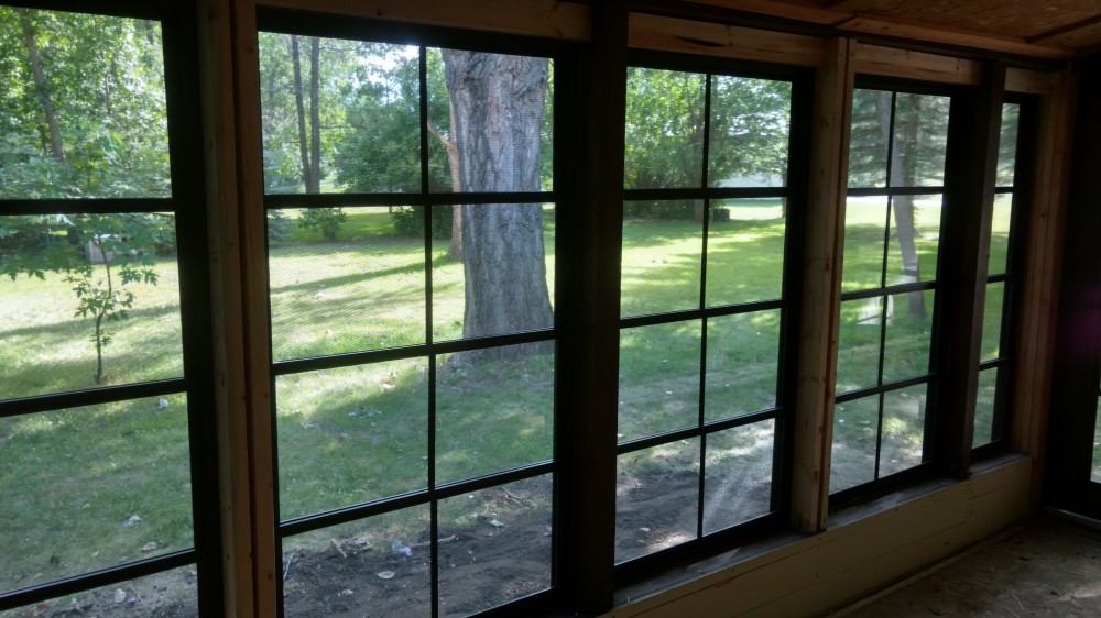 Photo By Souris River Designs & Home Improvement. Sunroom Makeover