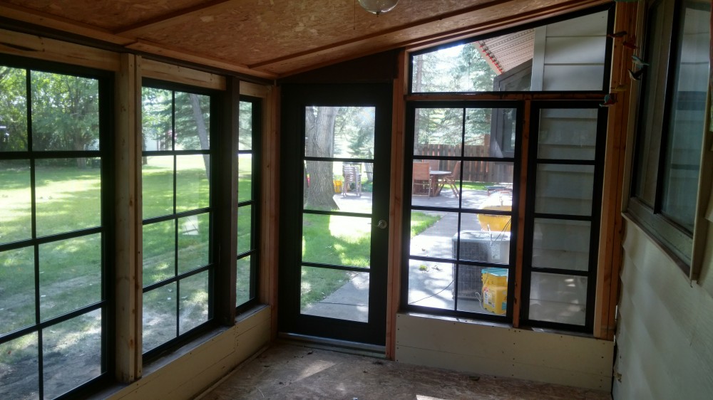 Photo By Souris River Designs & Home Improvement. Sunroom Makeover