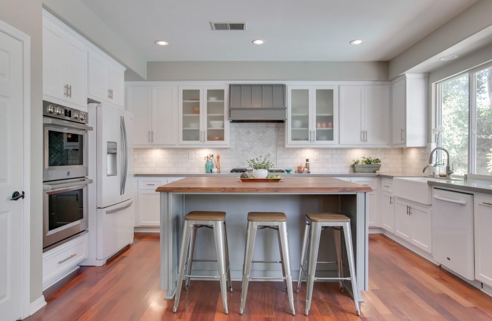 Photo By Reborn Cabinets, Inc.. Kitchen Refacing