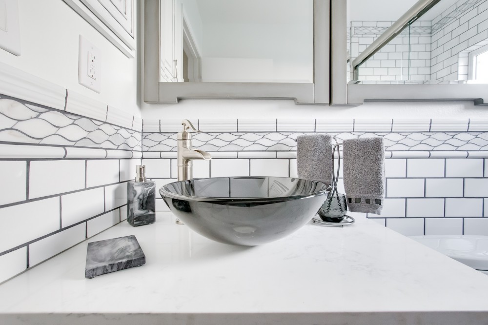 Photo By Reborn Cabinets, Inc.. Guest Bathroom Remodel