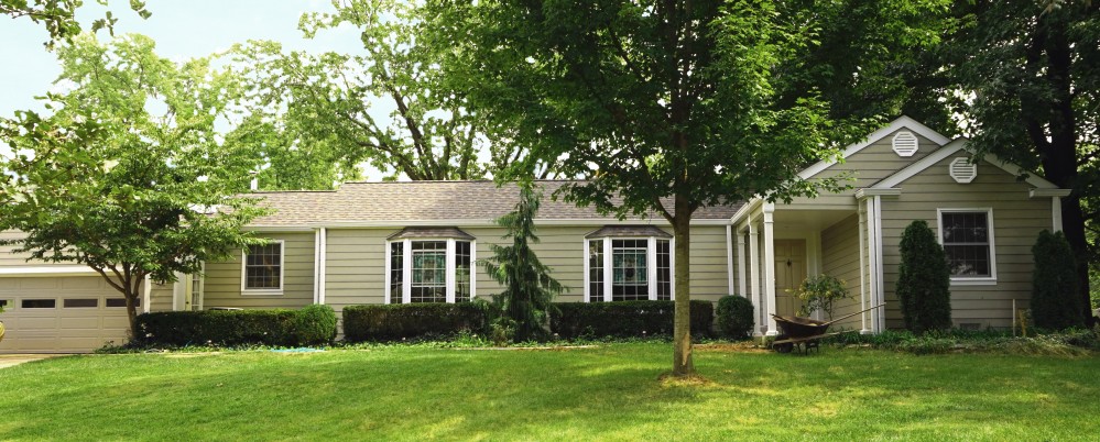 Photo By STL Siding Pros. Monterey Taupe James Hardie Siding