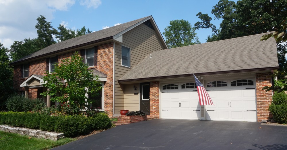 Photo By STL Siding Pros. James Hardie Khaki Brown Siding 