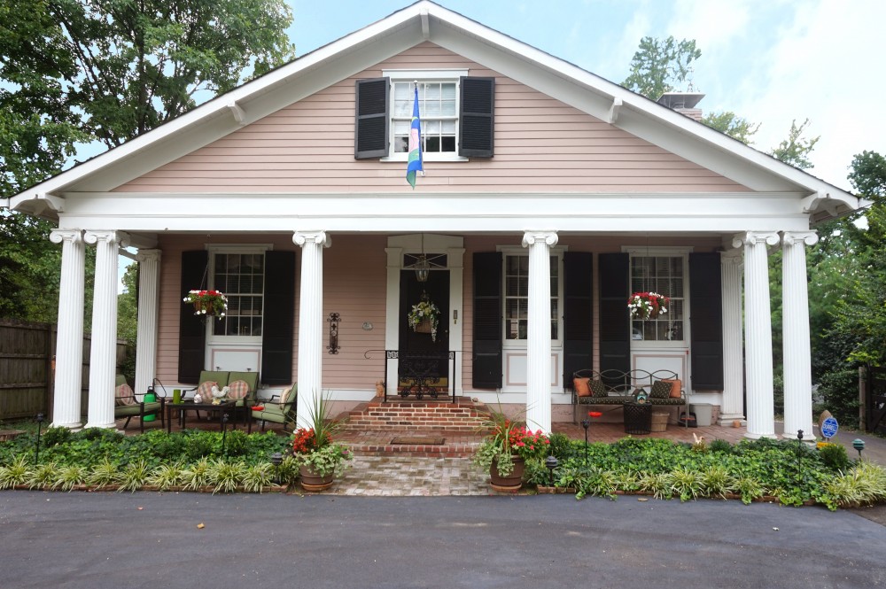 Photo By STL Siding Pros. Custom Pink James Hardie Siding