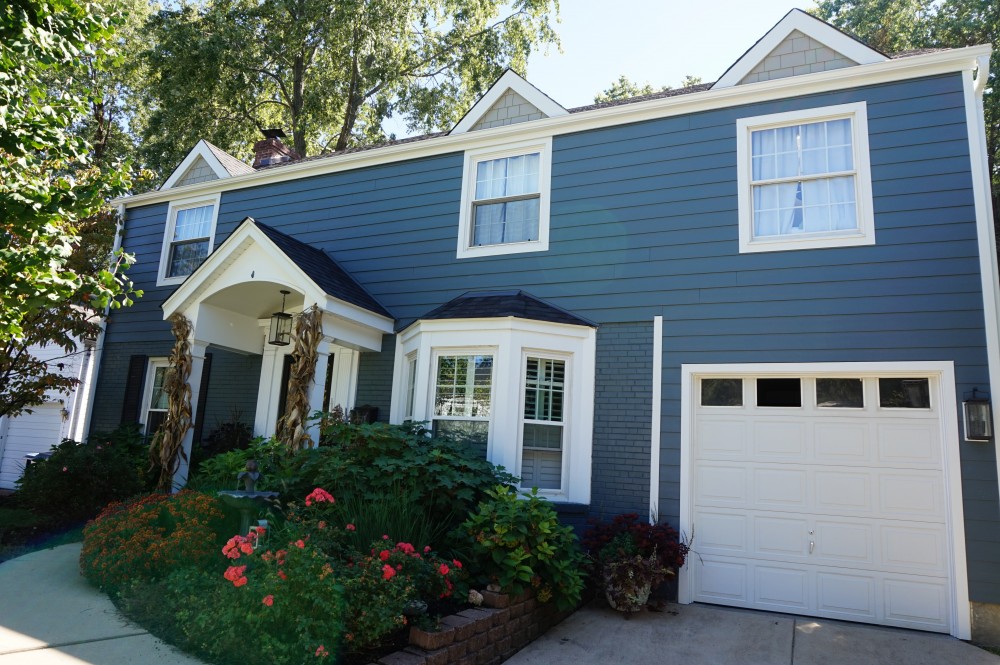 Photo By STL Siding Pros. James Hardie Lap Siding In Evening Blue
