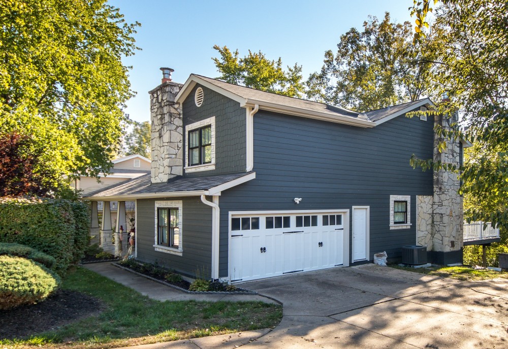 Photo By STL Siding Pros. Iron Gray James Hardie Lap Siding