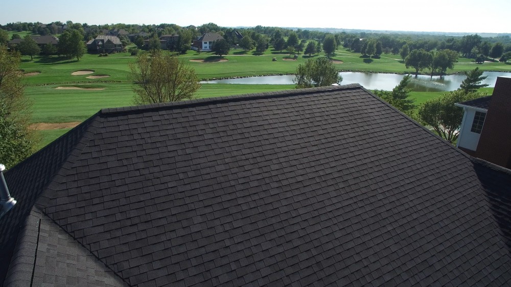 Photo By Apple Roofing. Onyx Black Roof