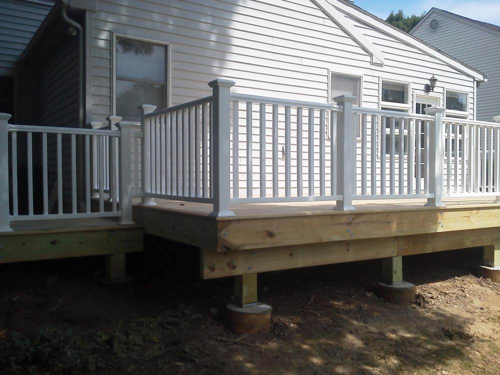Photo By TC Carpentry LLC. Decks