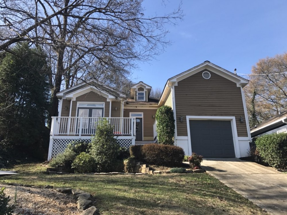 Photo By Nelson Exteriors. Bright Exterior Paint Job