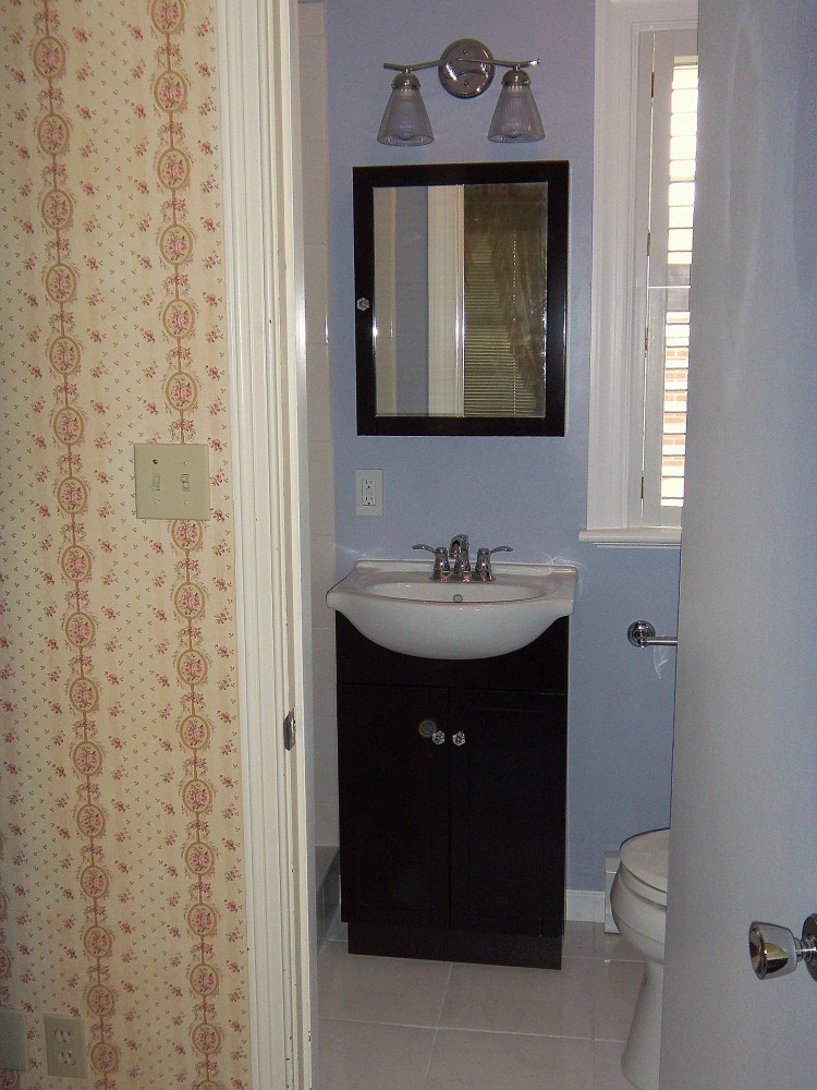 Photo By The Remodeling Company LLC. Bathroom Renovation V