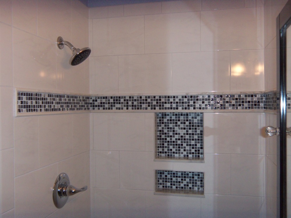 Photo By The Remodeling Company LLC. Bathroom Renovation V