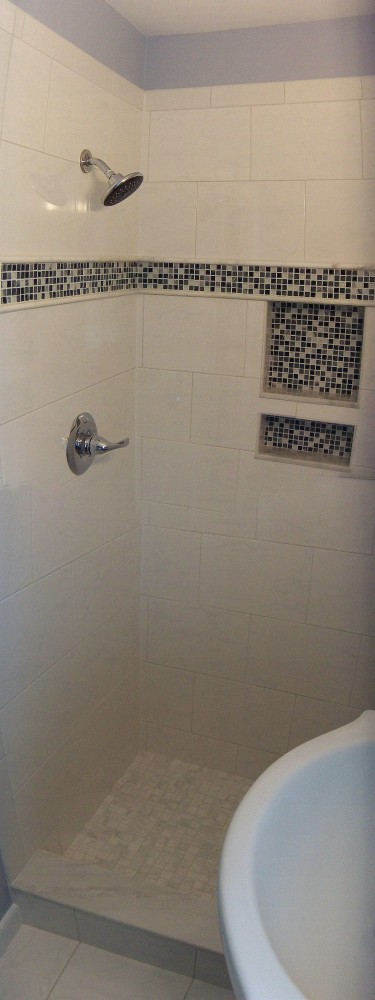 Photo By The Remodeling Company LLC. Bathroom Renovation V