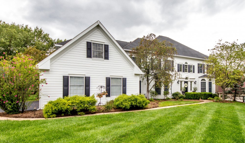 Photo By STL Siding Pros. Arctic White James Hardie Siding