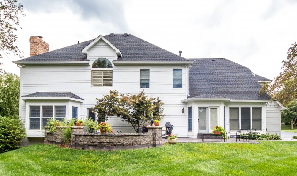 Photo By STL Siding Pros. Arctic White James Hardie Siding