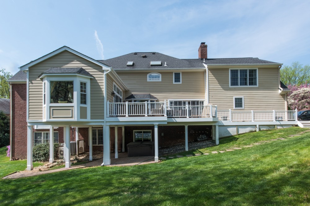 Photo By Ideal Construction And Remodeling. Rear, Family Room Addition, Deck Extension, And Interior Remodel In McLean, VA