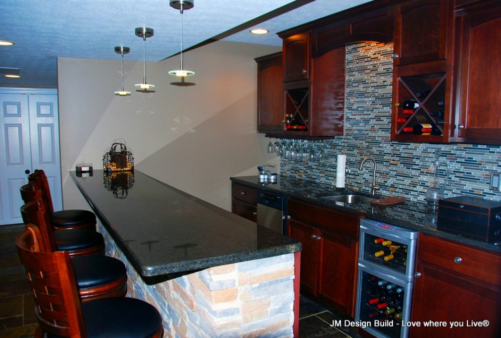 Photo By JM Design Build & Remodeling. Basement Finish - Strongsville, OH