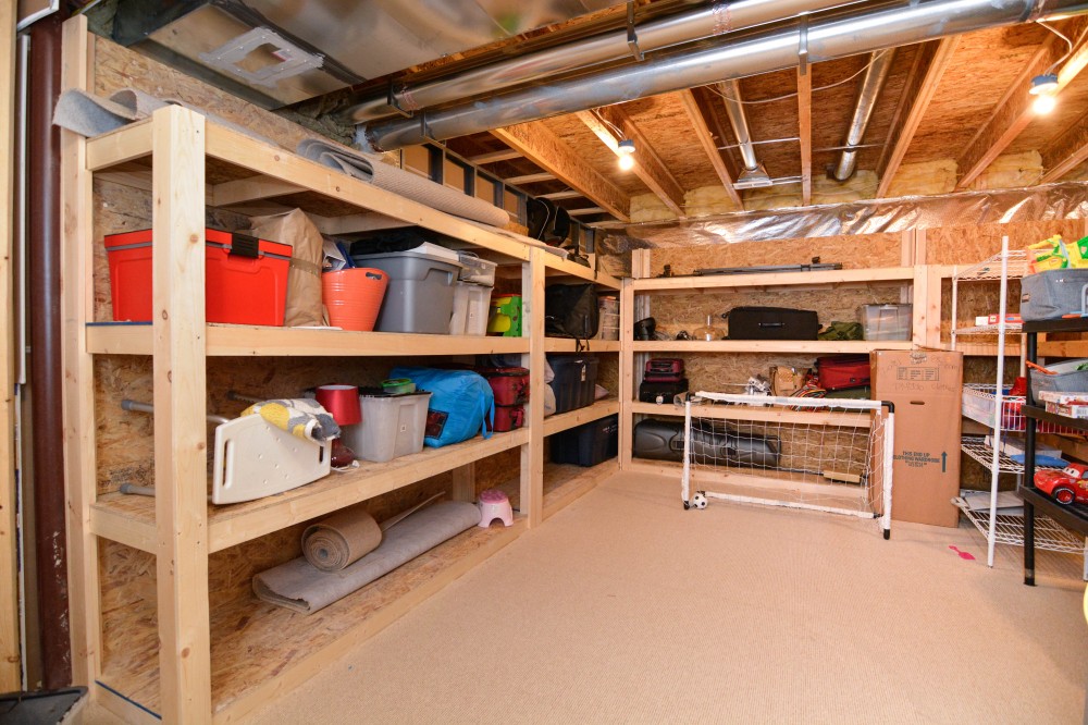 Photo By Miller Remodeling Design/Build. Finished Basement