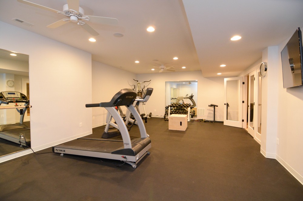 Photo By Miller Remodeling Design/Build. Finished Basement