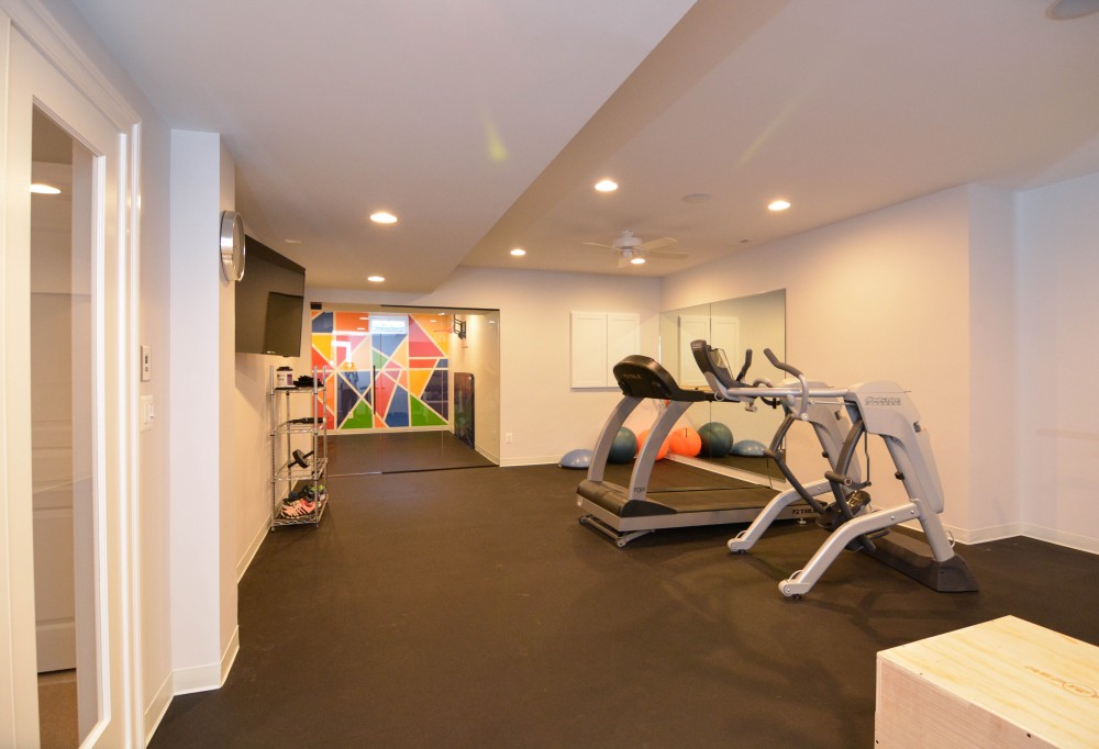 Photo By Miller Remodeling Design/Build. Finished Basement