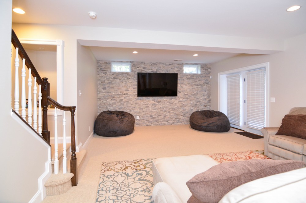 Photo By Miller Remodeling Design/Build. Finished Basement