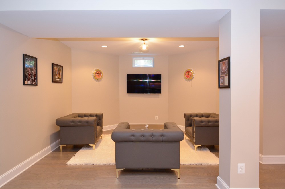 Photo By Miller Remodeling Design/Build. Finished Basement