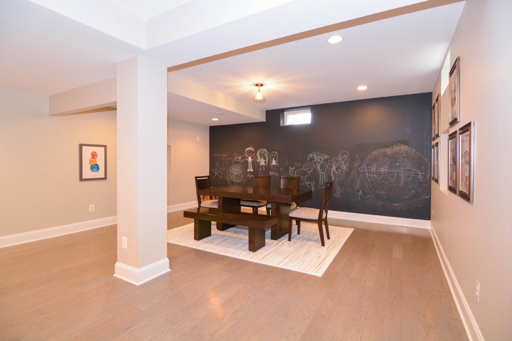 Photo By Miller Remodeling Design/Build. Finished Basement