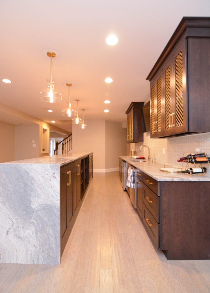 Photo By Miller Remodeling Design/Build. Finished Basement