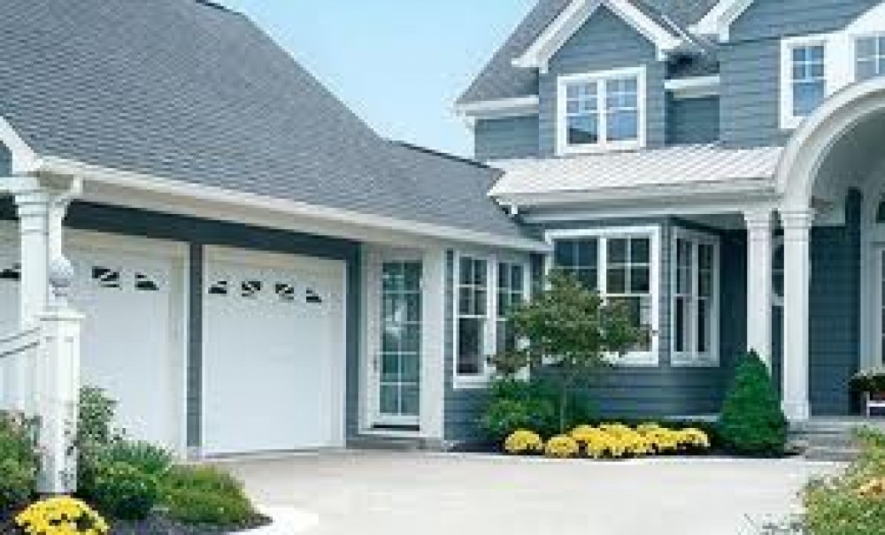 Photo By GQ Builders. John's Window Remodel