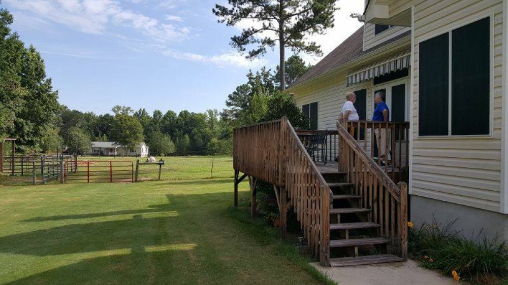 Photo By All American Exteriors. Back Porch Addition