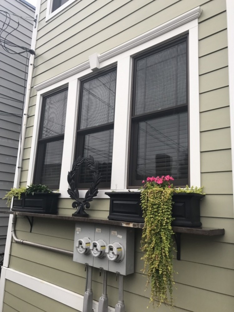 Photo By Pro Home 1. New James Hardie Siding On This Enclosed Porch And Garage