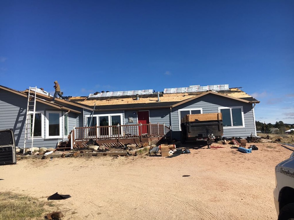 Photo By Divine Roofing, Inc.. Roof Replacement 
