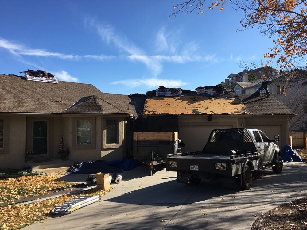 Photo By Divine Roofing, Inc.. Roof Replacement 