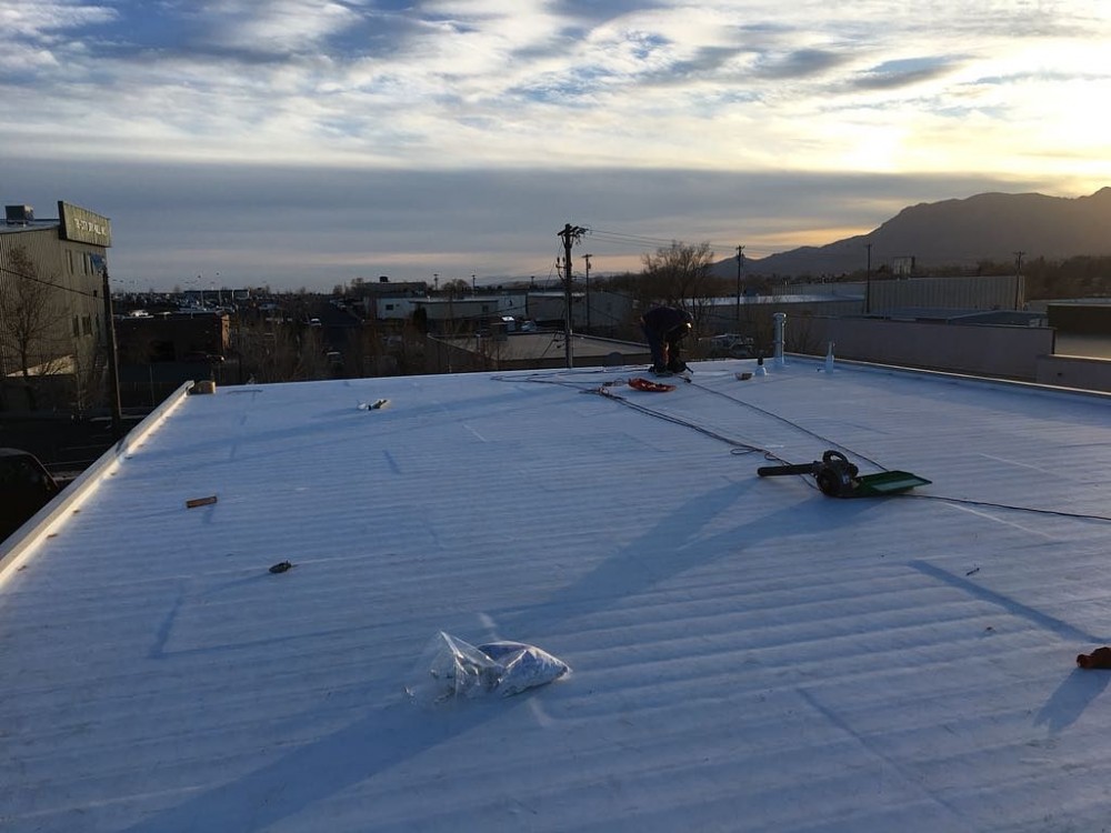 Photo By Divine Roofing, Inc.. Commercial Re-roof